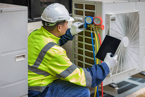 Professional Hvac technician working in Hampton, MD